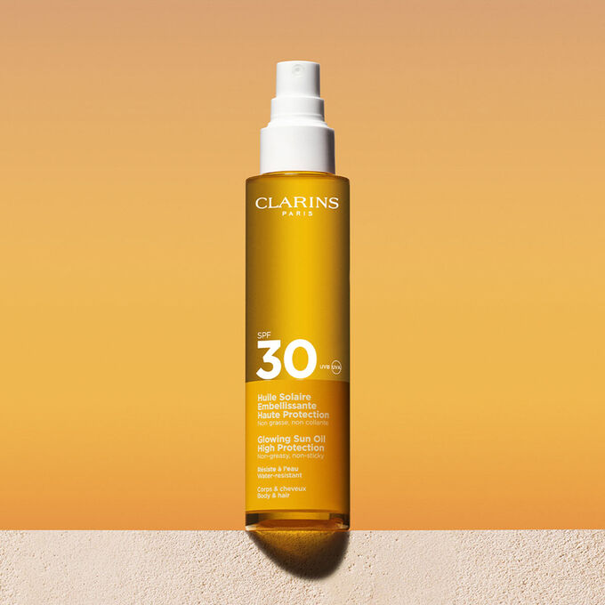 زيت للشمس لامع بحماية عالية SPF30
